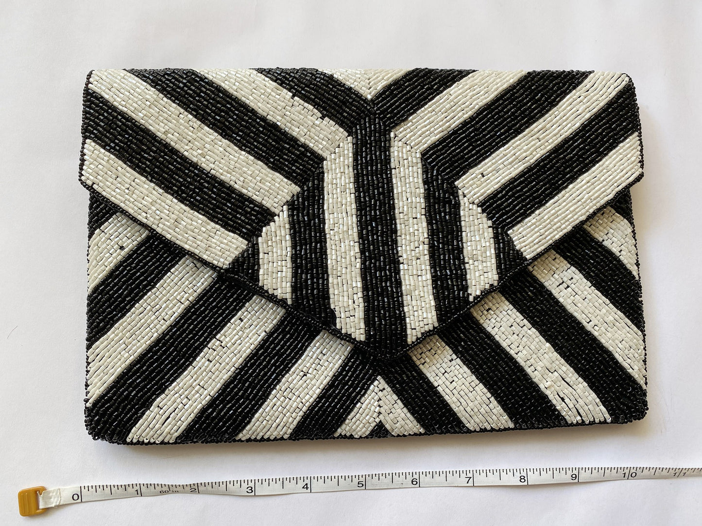 delia black/white stripe clutch
