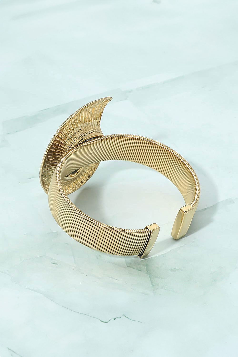 spiral shell accent cuff bracelet